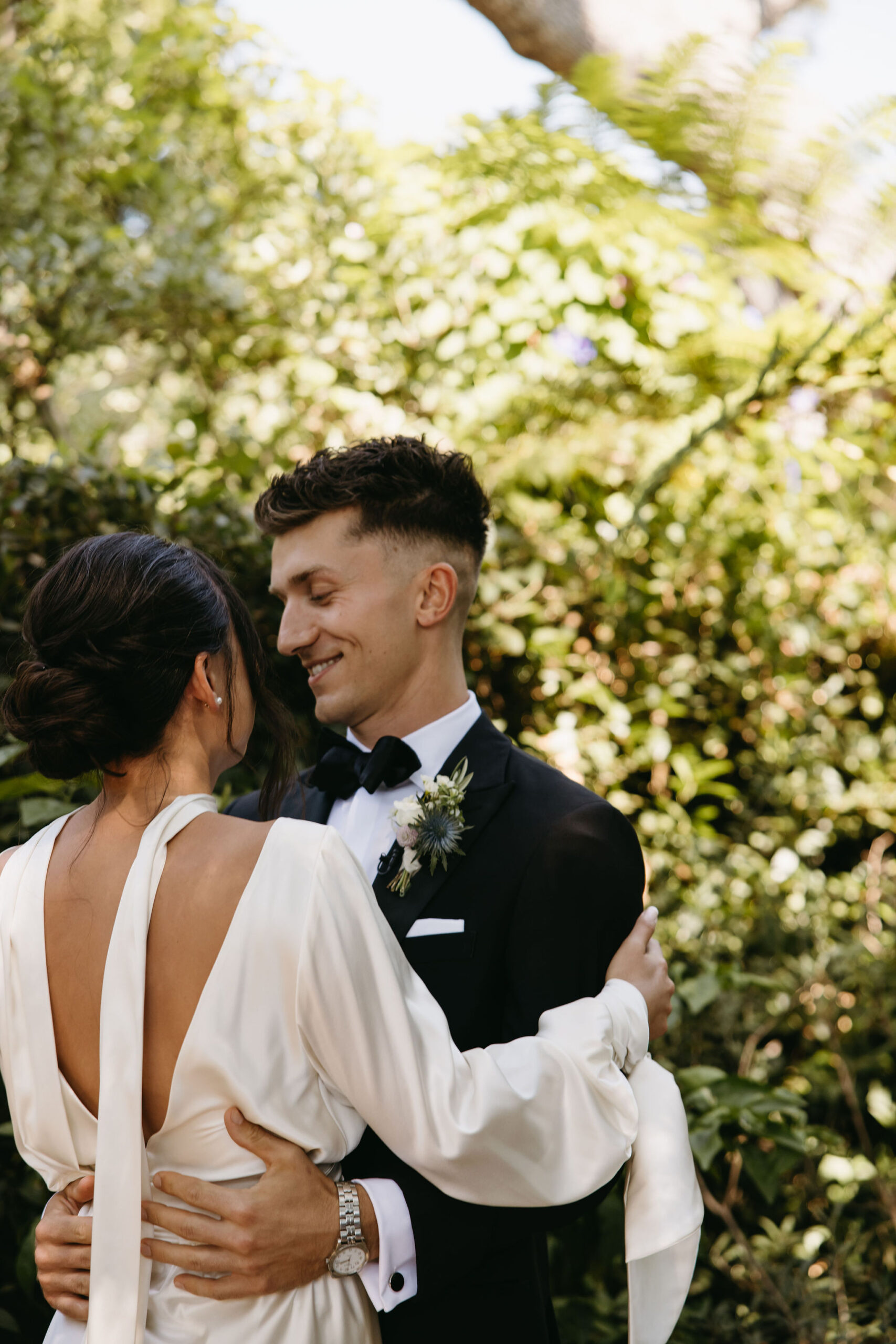 bride and groom take their documentary style wedding photos  outdoors 