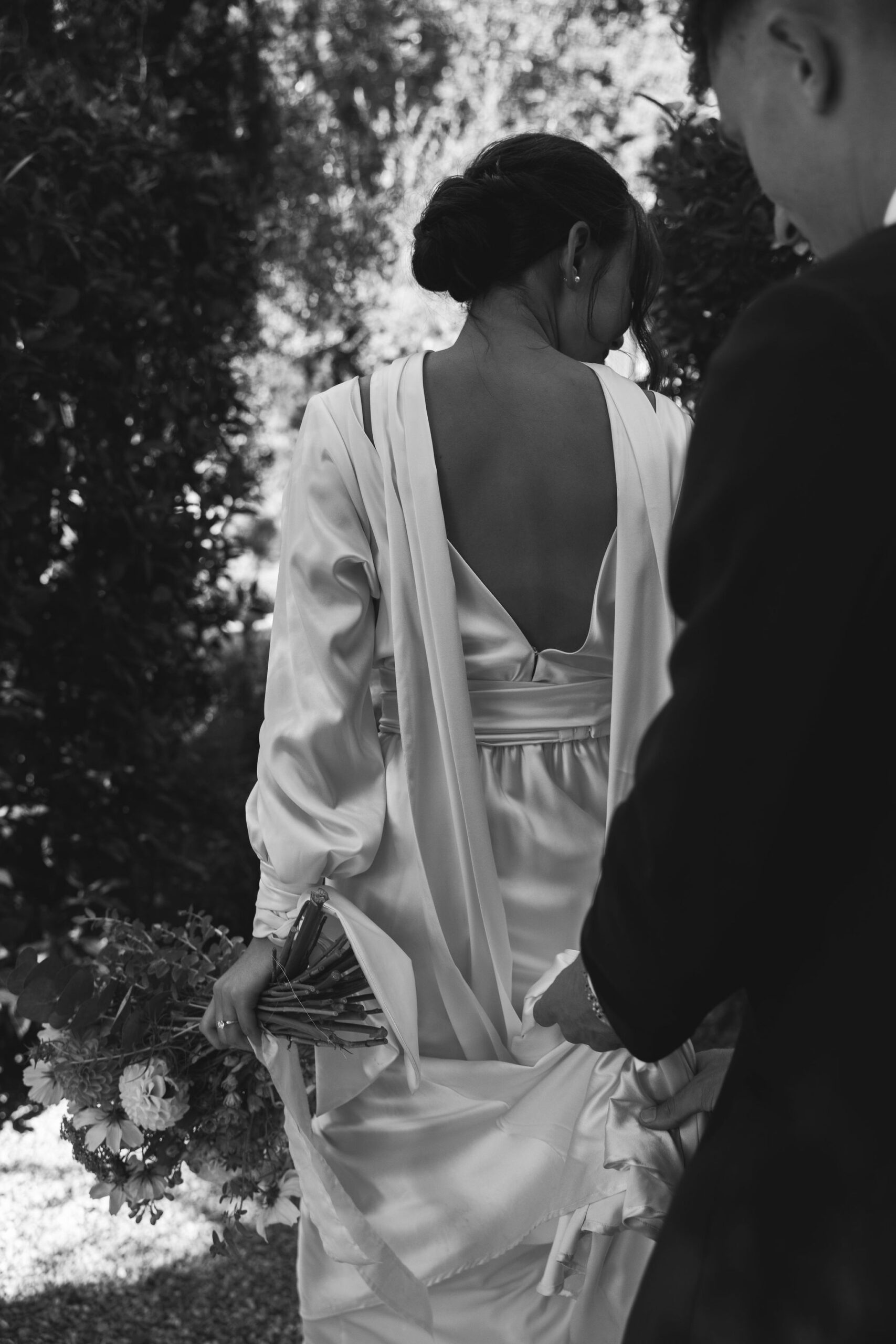 bride and groom take their documentary style wedding photos  outdoors 