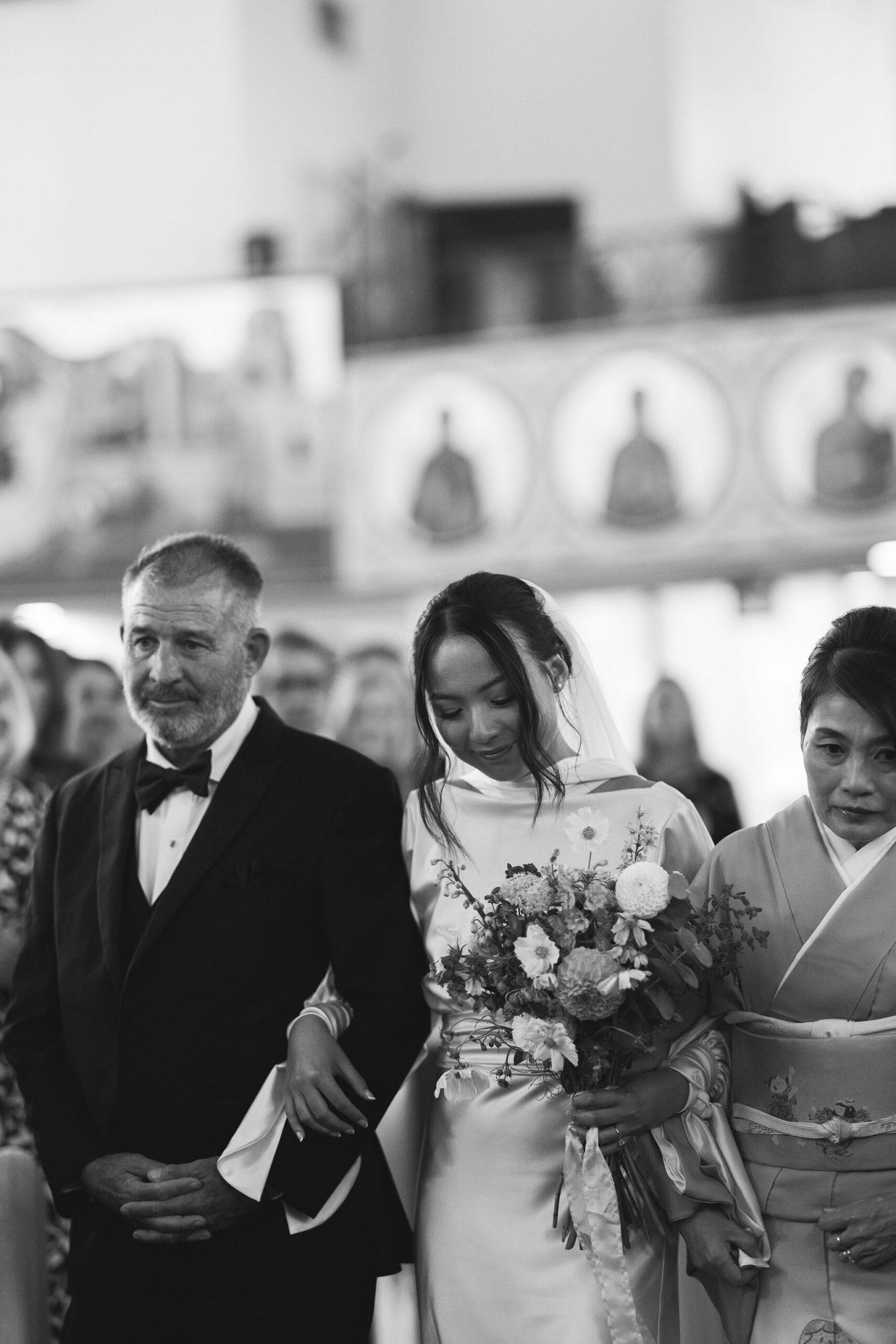 Bride walks down the aisle at a wedding ceremony