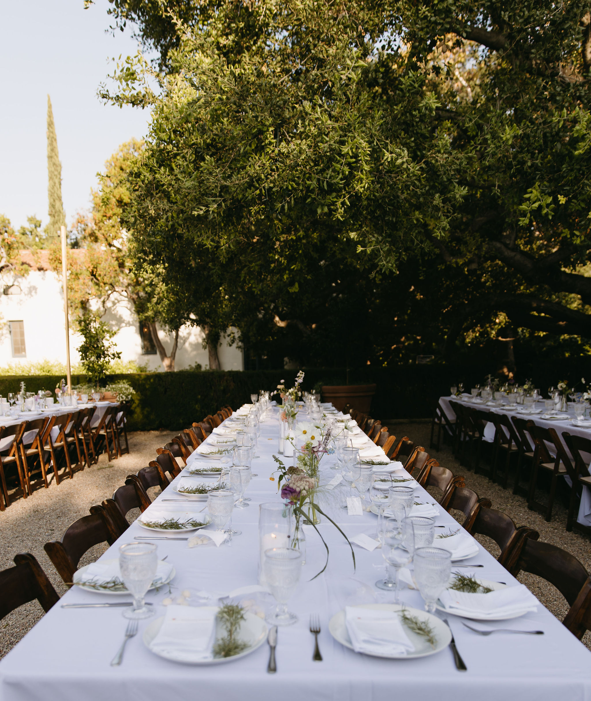 Wedding tablescape decorated with candles and flowers for a wedding reception