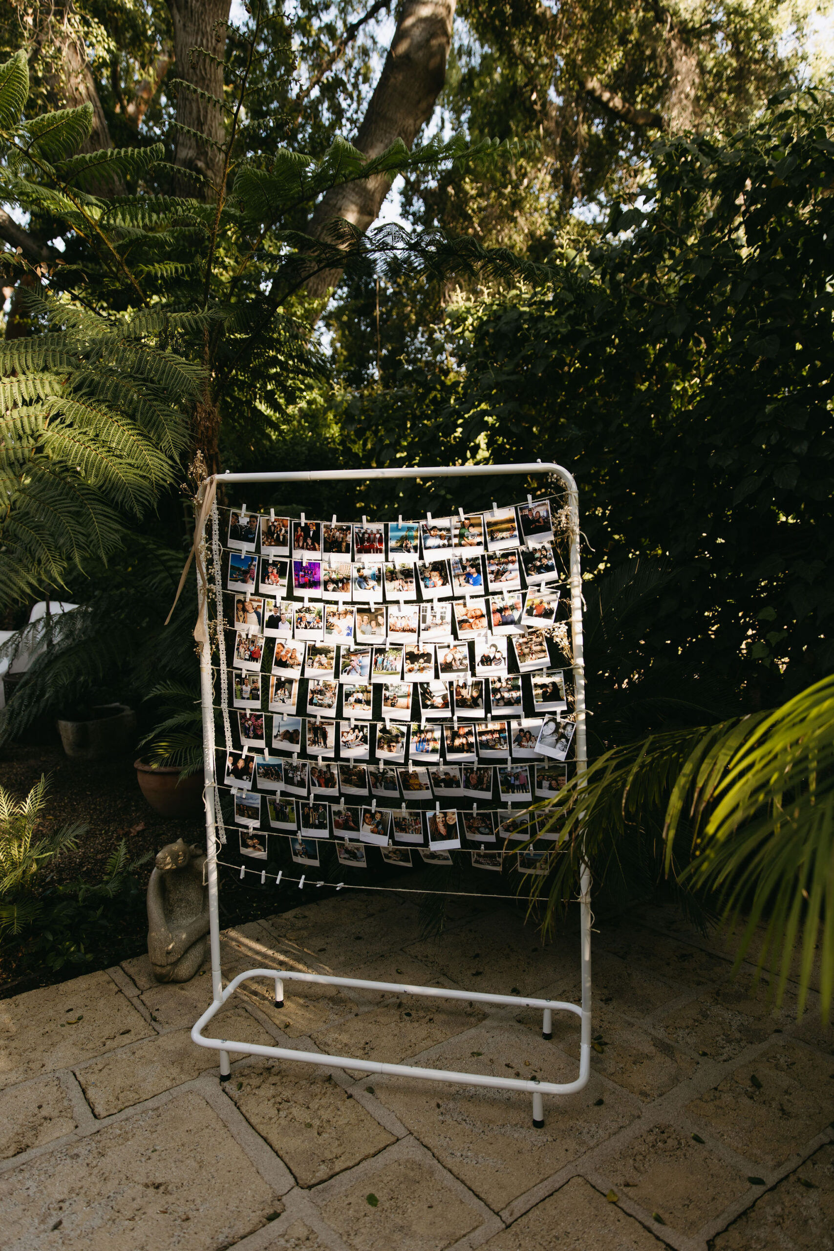 collage of photos of the bride and groom on a wall outdoors for a wedding ceremony