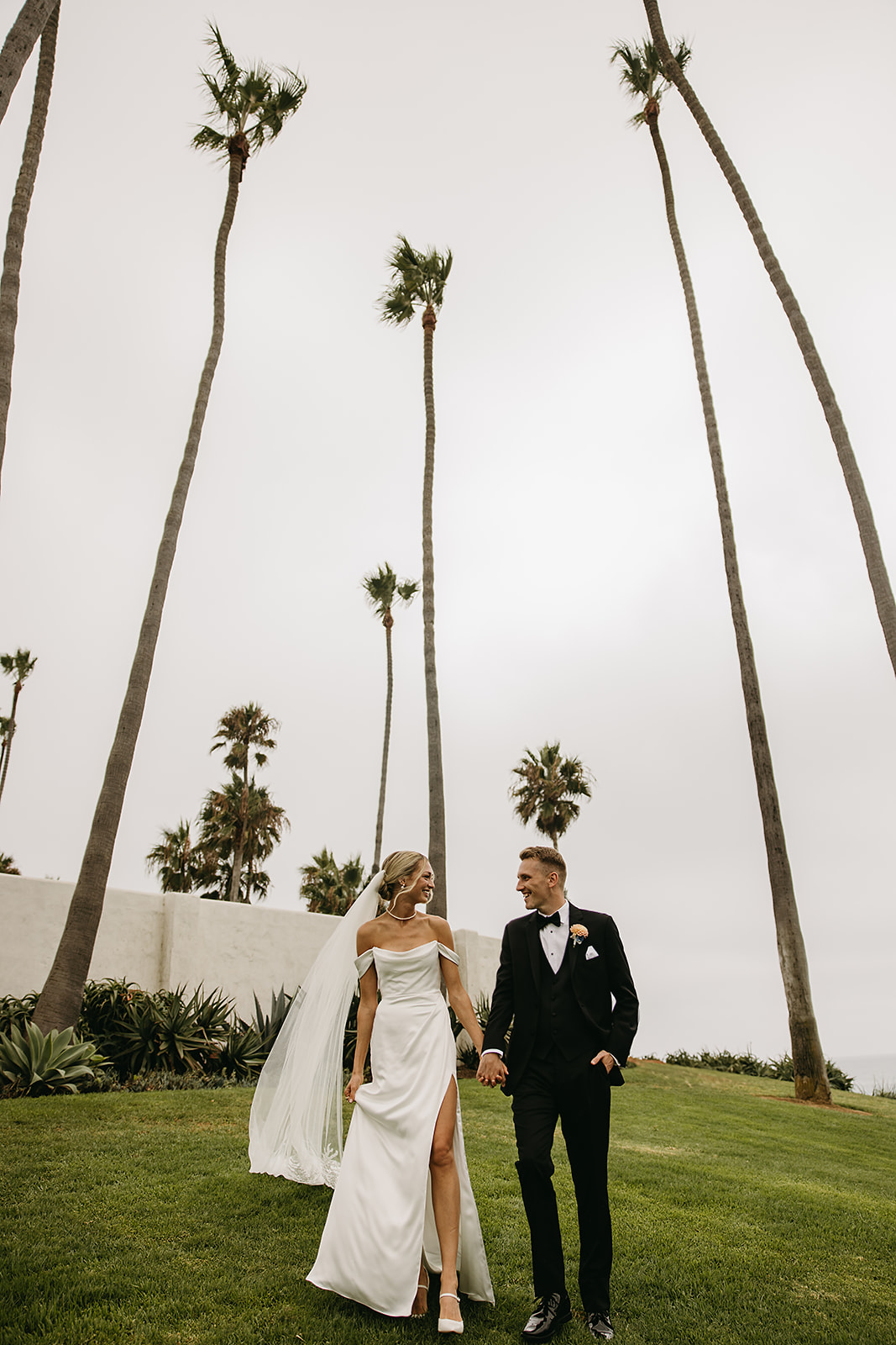  Bride and groom take wedding portraits outside their wedding venue Ole Hanson