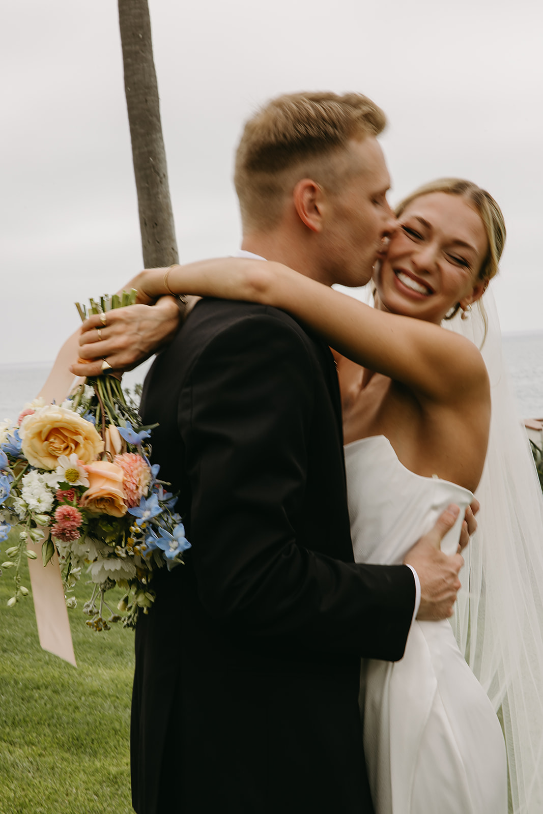 Bride and groom take wedding portraits outside their wedding venue Ole Hanson