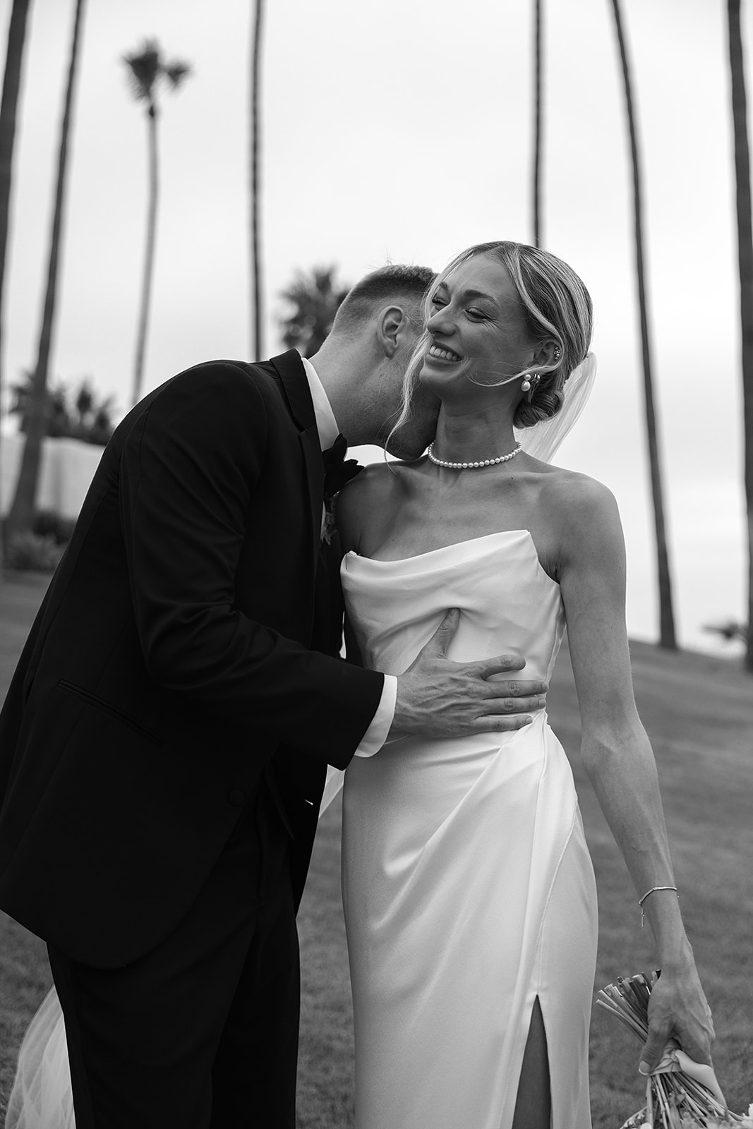 Bride and groom take wedding portraits outside their wedding venue Ole Hanson