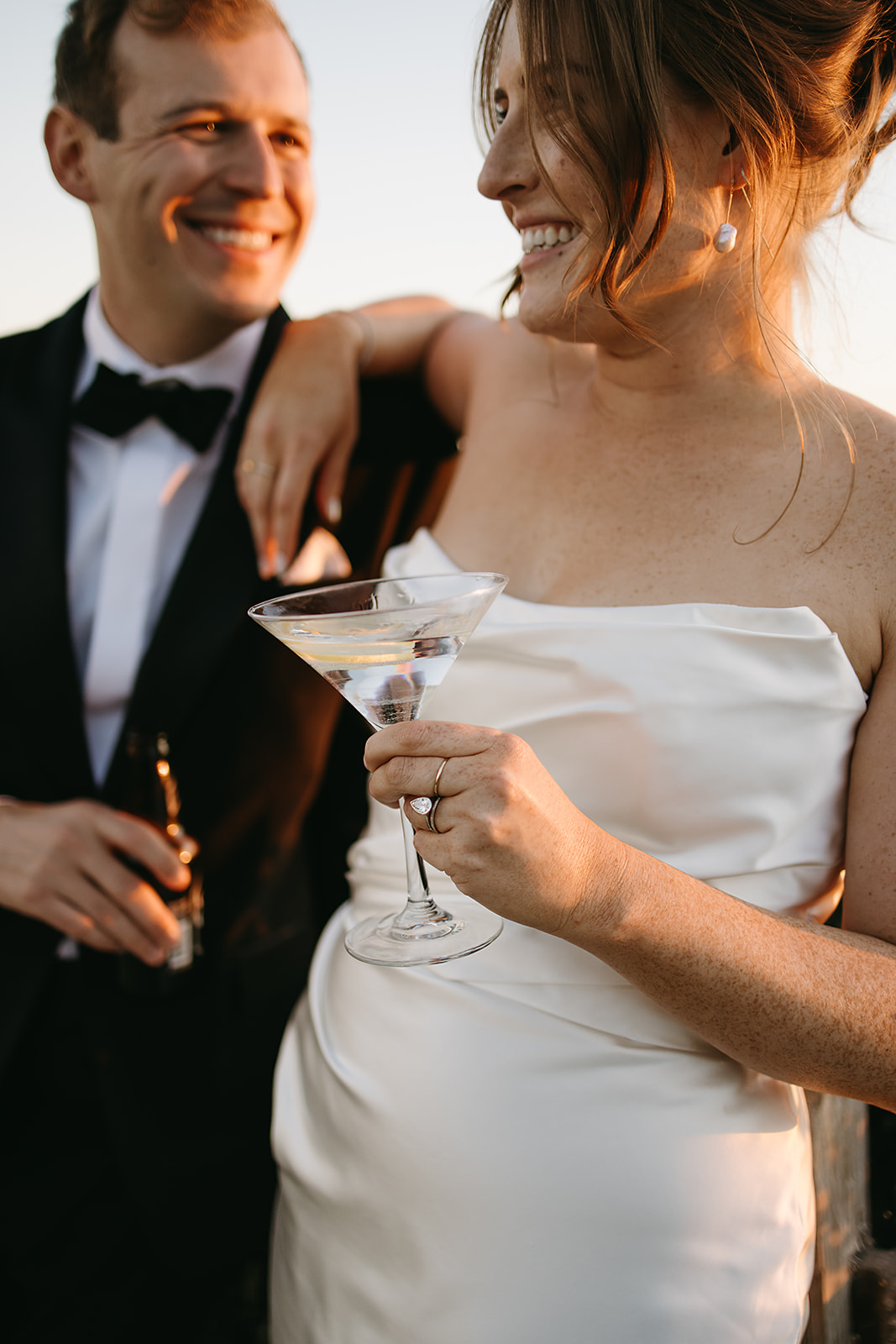 Bride and groom take wedding portraits outdoors at Ritz Carlton Bacara in Santa Barbara