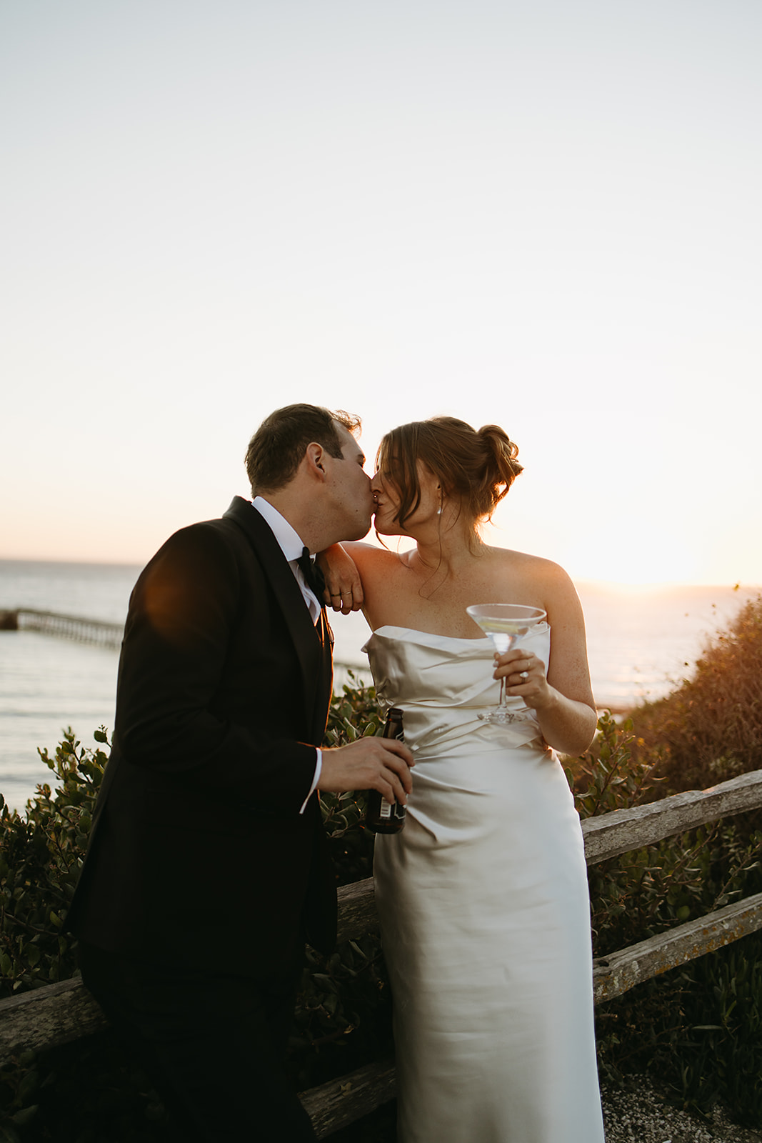 Bride and groom take wedding portraits outdoors at Ritz Carlton Bacara in Santa Barbara