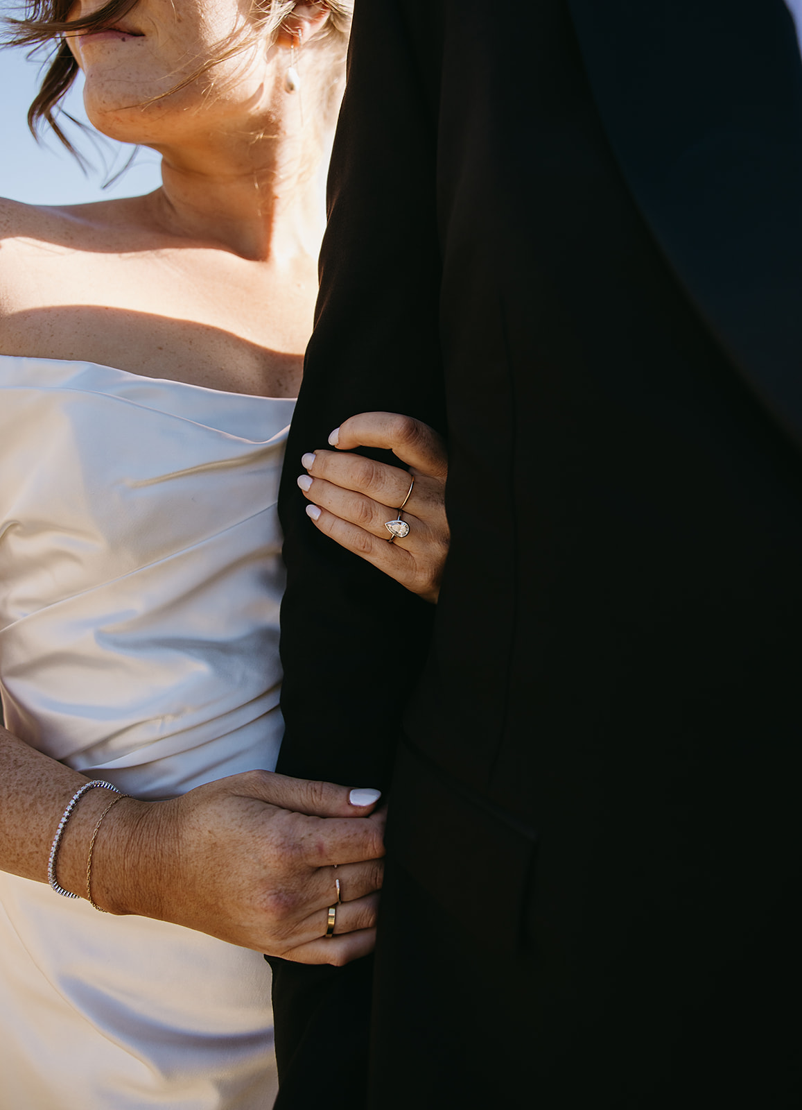 Bride and groom take wedding portraits outdoors at Ritz Carlton Bacara in Santa Barbara