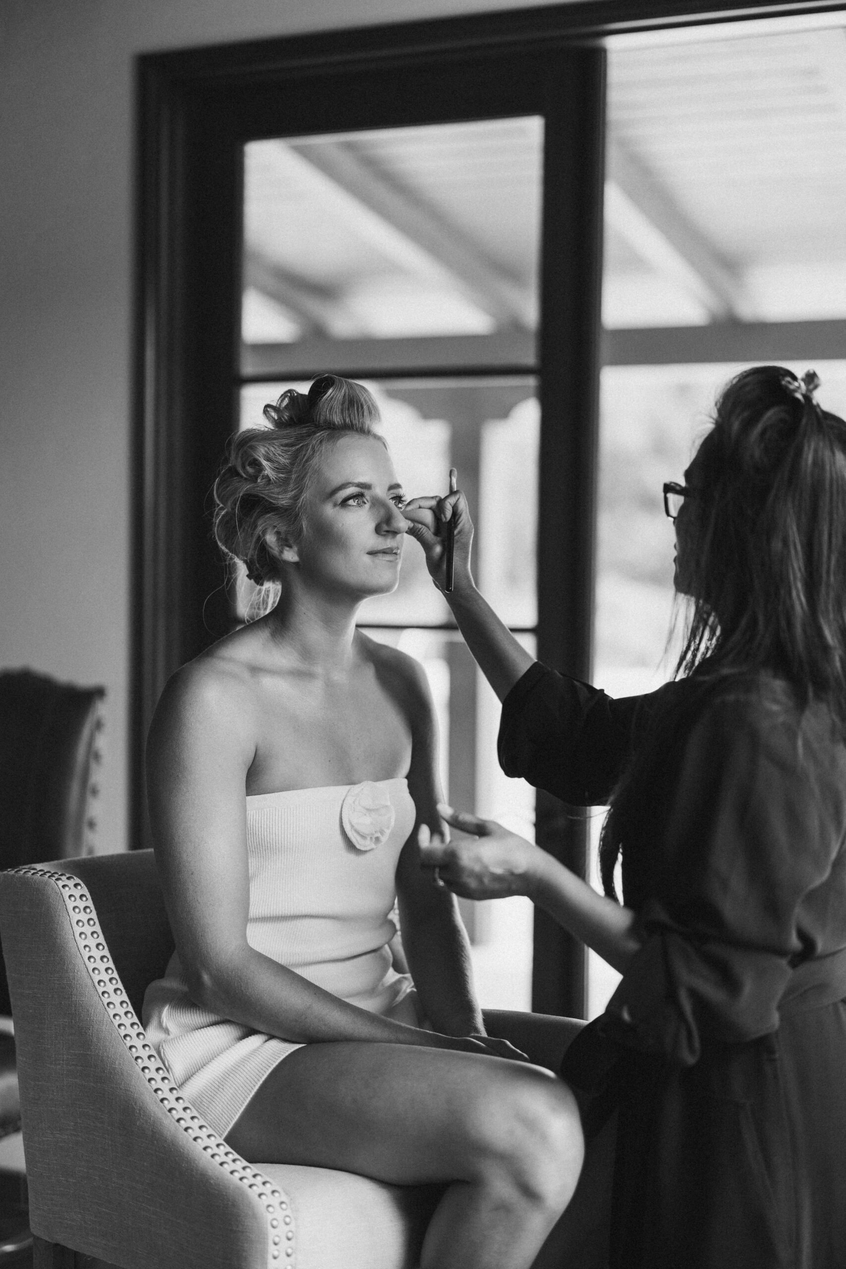 bride getting ready in her suite at quail ranch