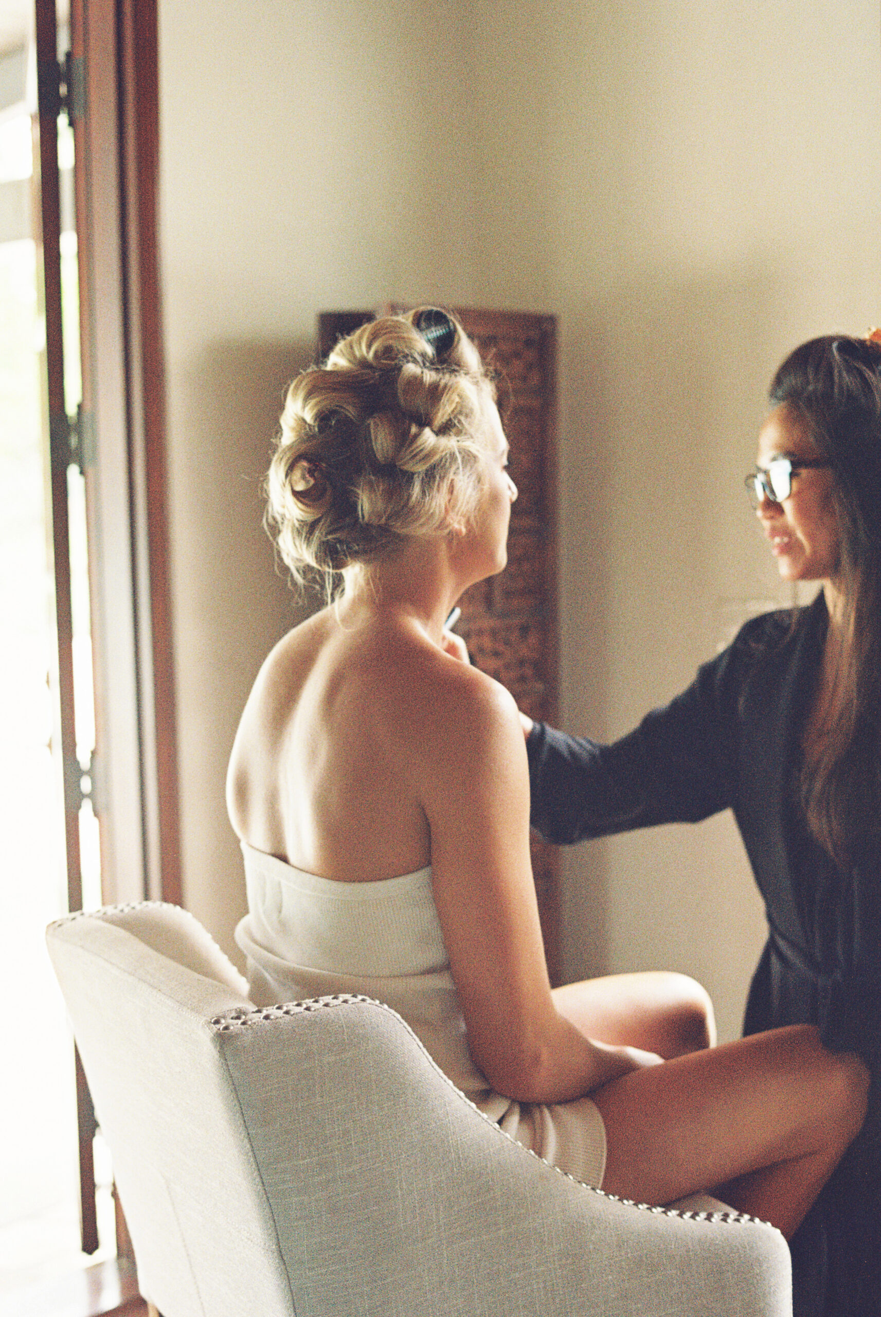 bride getting ready in her suite at quail ranch