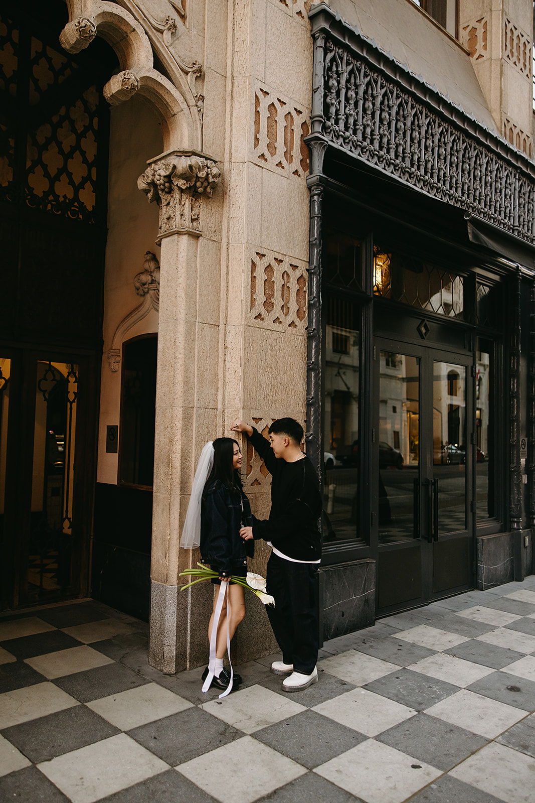 couple takes engagement photos on the street in downtown LA 