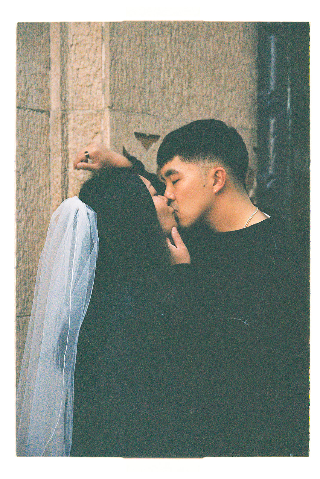 couple takes engagement photos on the street in downtown LA 