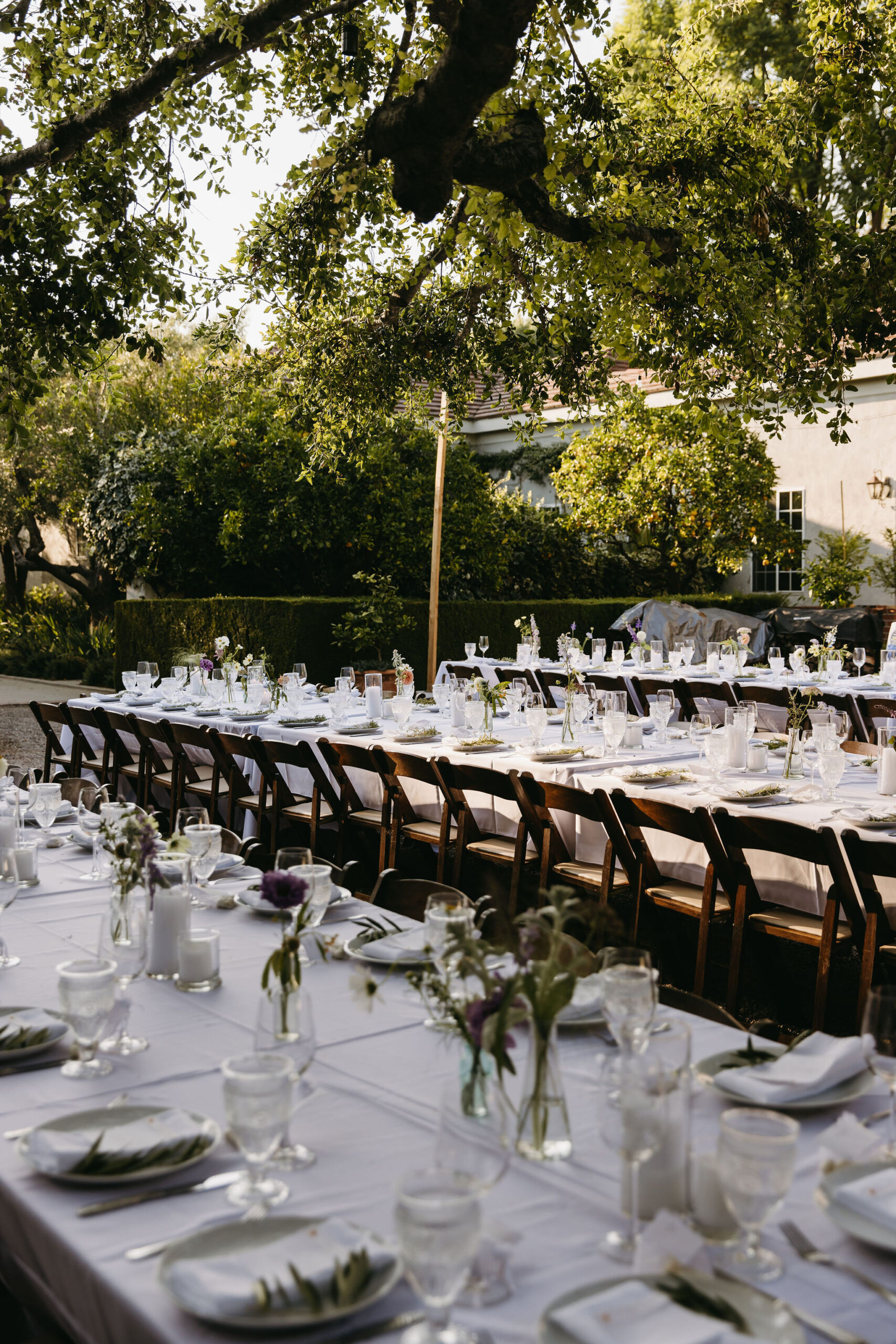 Wedding tablescape decorated with candles and flowers for a wedding reception