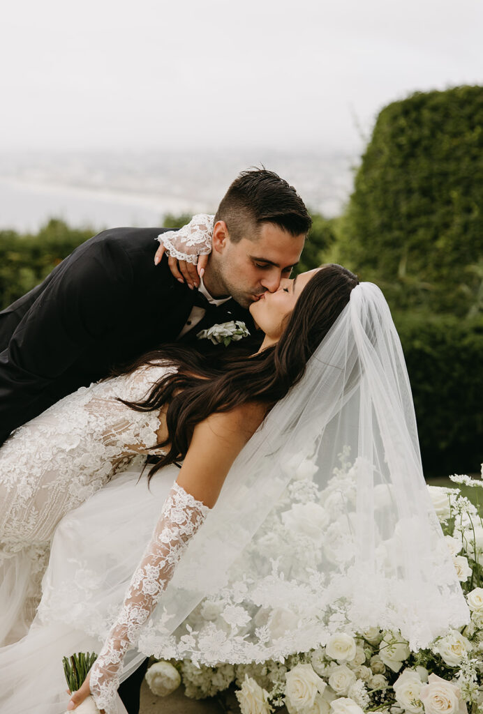 bride and groom take their portraits for their wedding at La Venta Inn